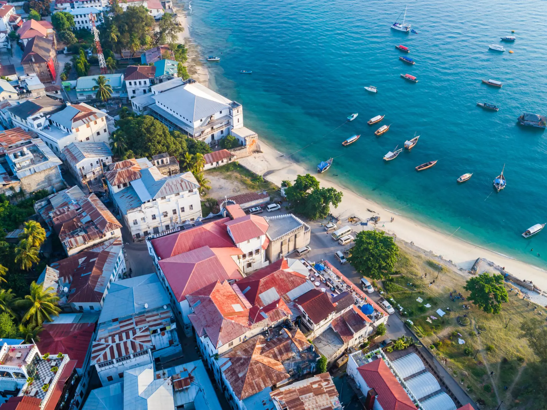 Aerial view of Zanzibar's historic coastal town and anchored boats